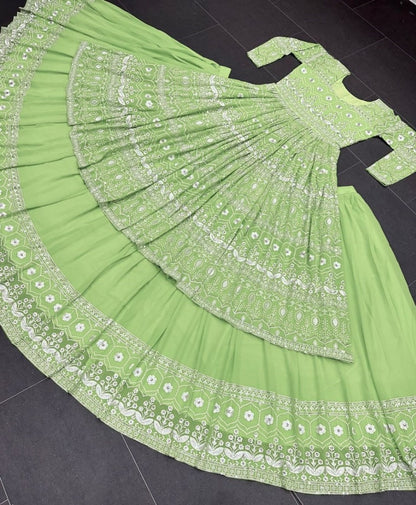 Pista green heavy embroidery worked lehenga suit for wedding ceremony
