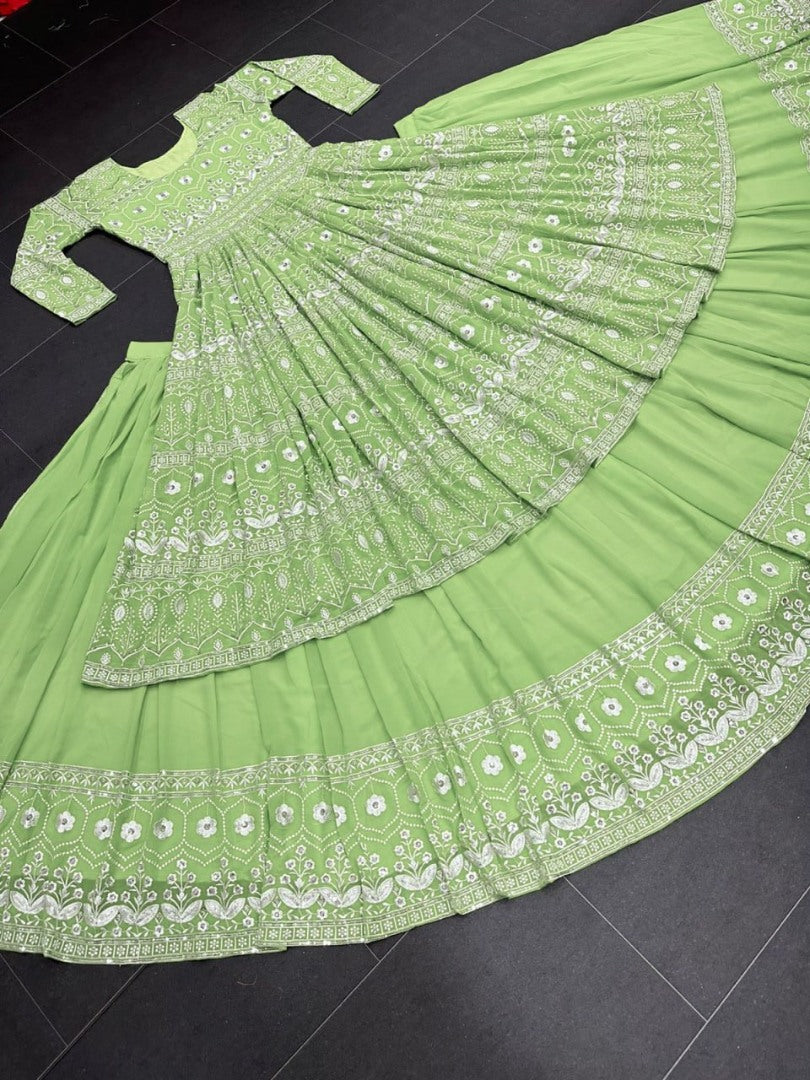 Pista green heavy embroidery worked lehenga suit for wedding ceremony
