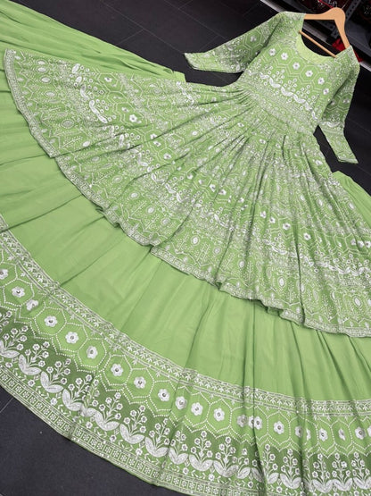 Pista green heavy embroidery worked lehenga suit for wedding ceremony