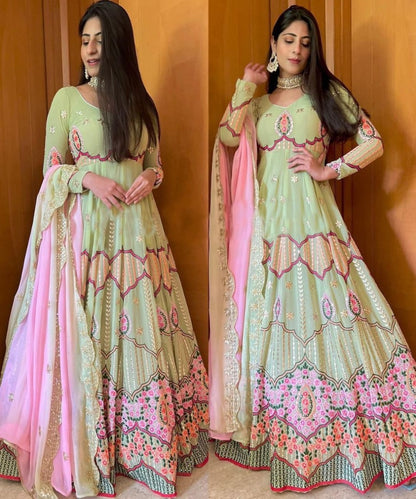 Pista green heavy sequence embroidery work designer gown for wedding