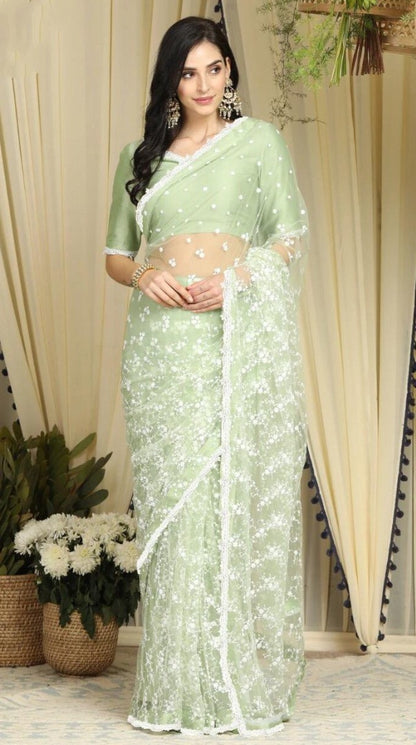 Pista green heavy soft net thread work elegant look saree