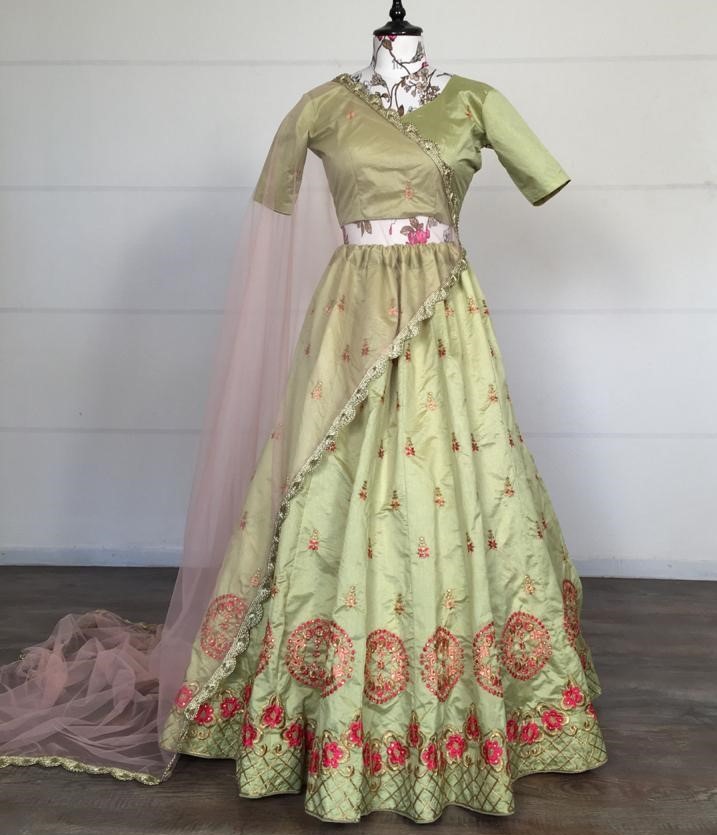 Pista green kitkat silk embroidered stone work lehenga choli