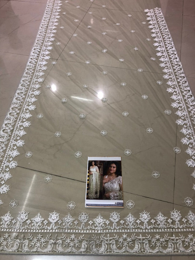 Pista green mono net designer embroidered saree