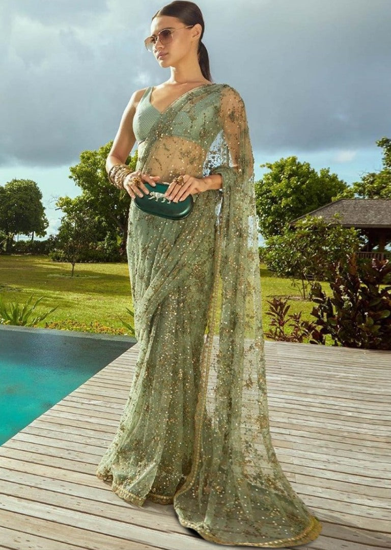 Pista green mono net fancy thread and sequence worked wedding saree