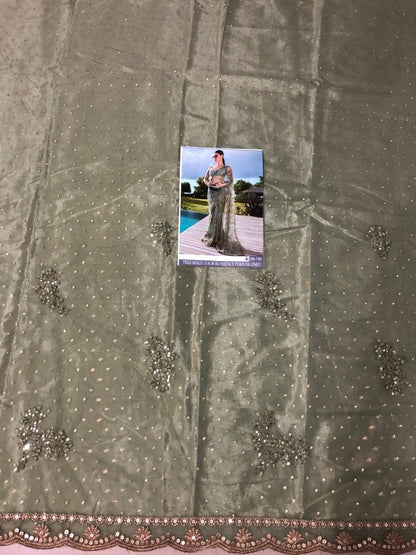 Pista green mono net fancy thread and sequence worked wedding saree