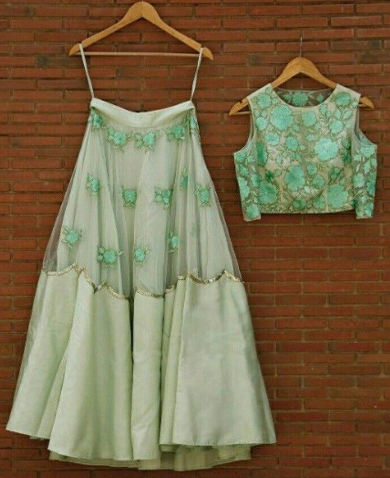 Pista green net and satin fabulous crop top lehenga