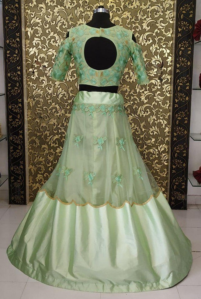 Pista green net and satin fabulous crop top lehenga
