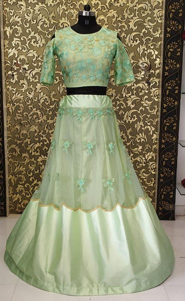 Pista green net and satin fabulous crop top lehenga