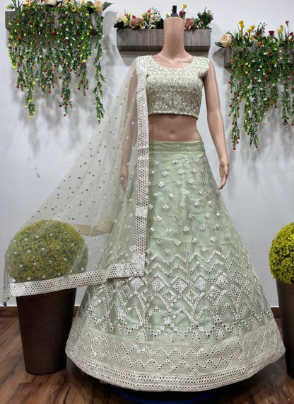 Pista green net embroidered lehenga choli