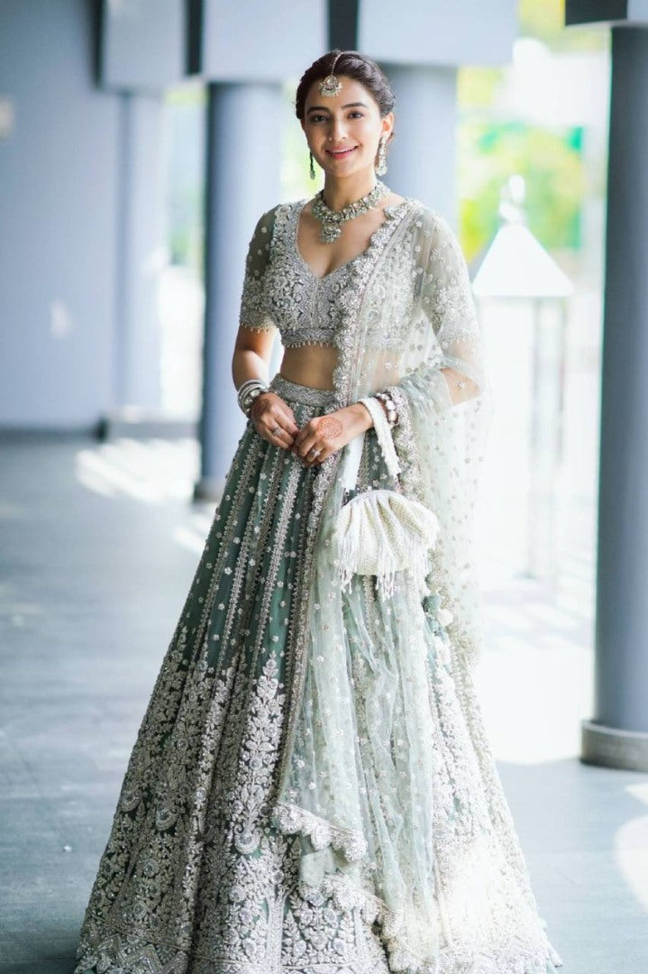 Pista green net heavy work wedding lehenga choli