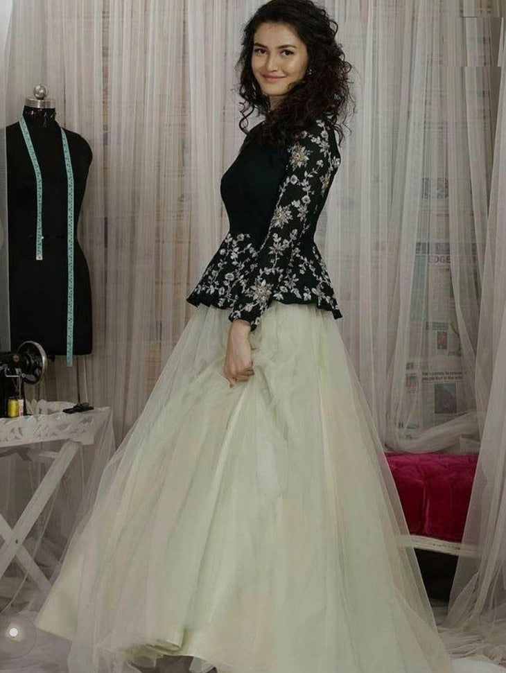 Pista green net lehenga with velvet crop top