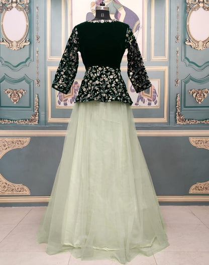 Pista green net lehenga with velvet crop top
