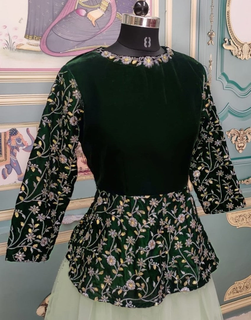 Pista green net lehenga with velvet crop top