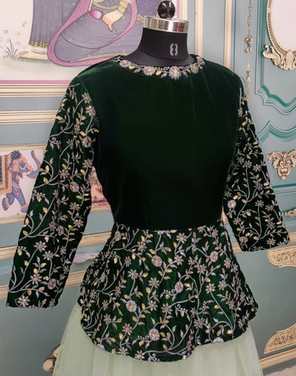 Pista green net lehenga with velvet crop top