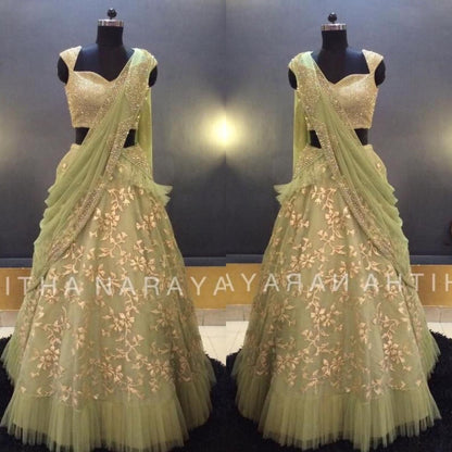 Pista green net thread zari work ruffle border wedding lehenga choli