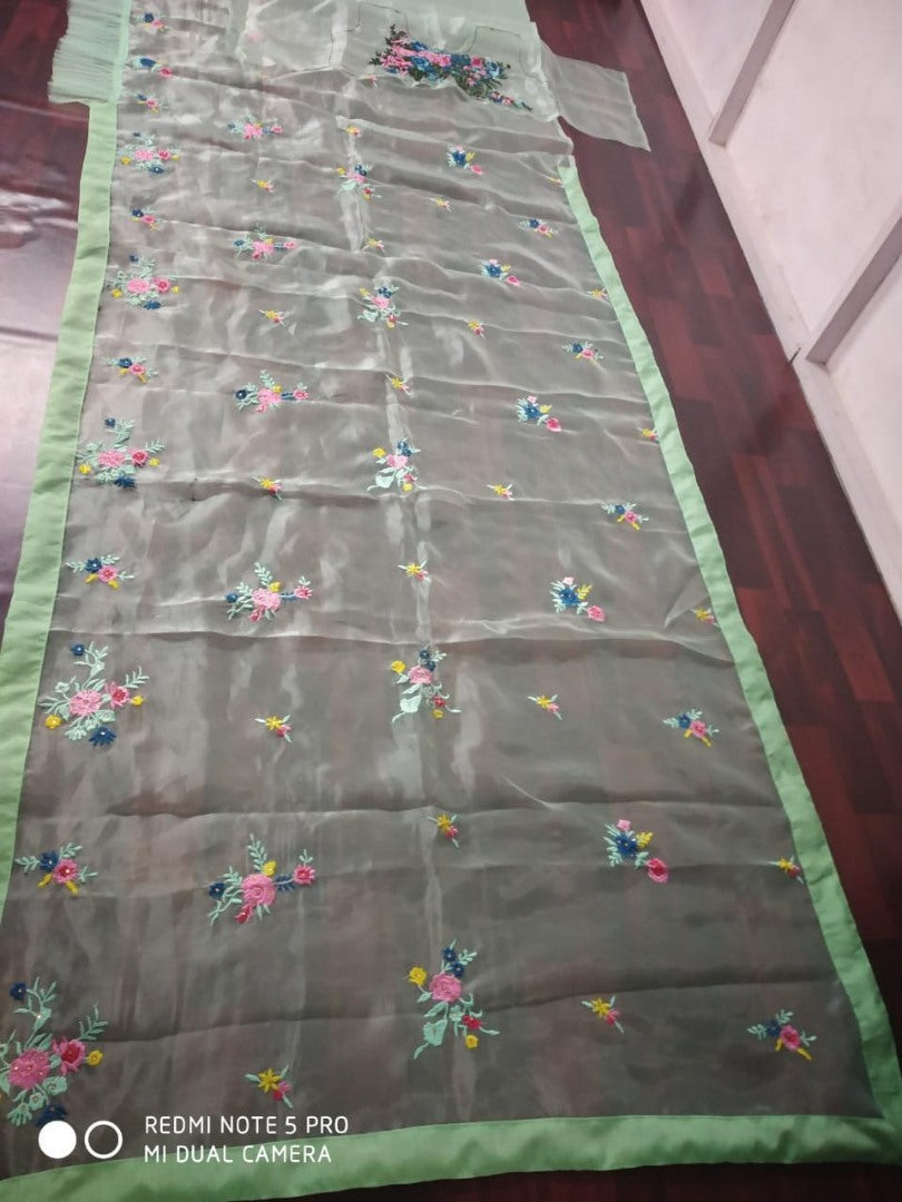 Pista green organza silk multi threadwork saree