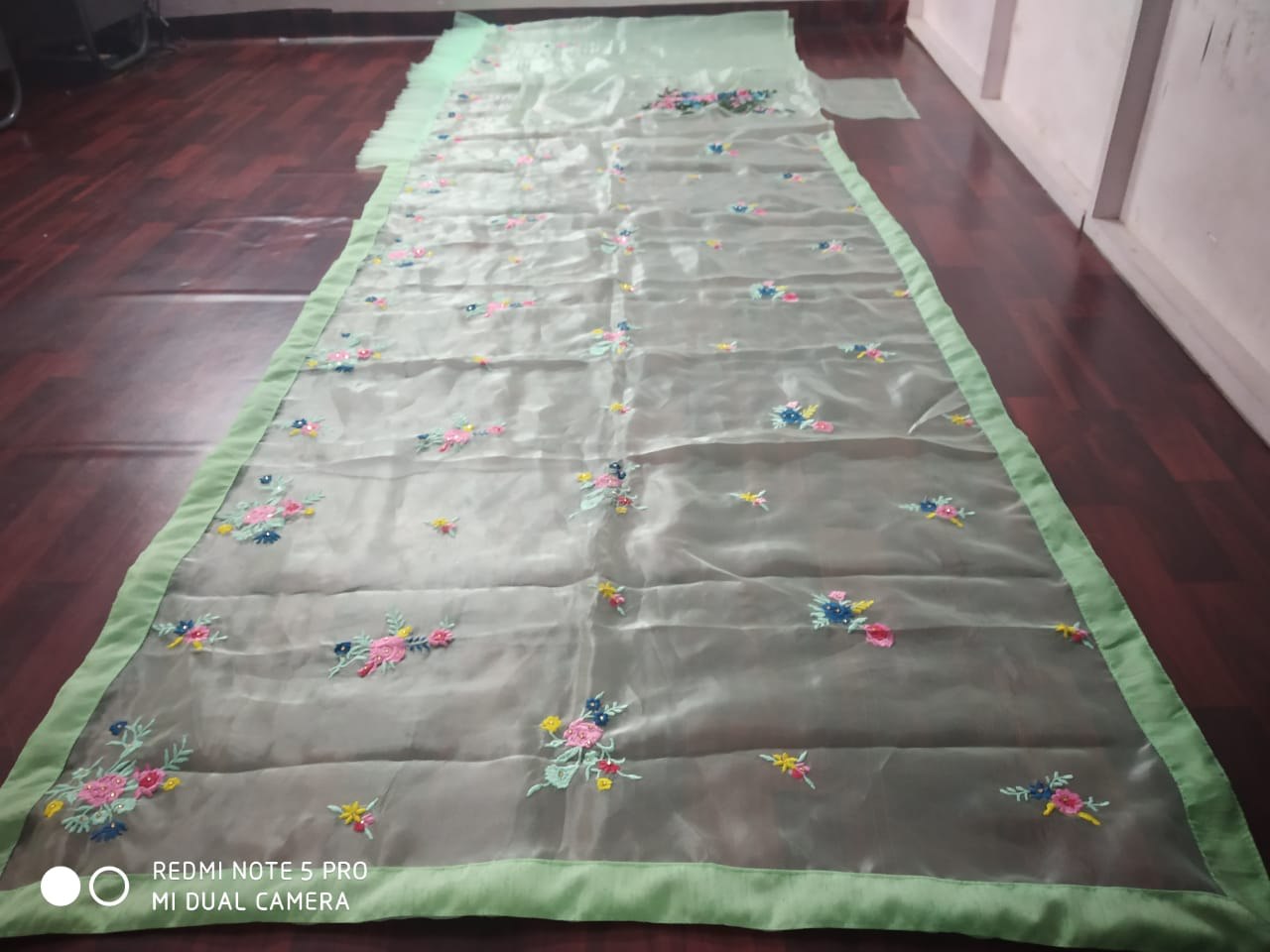 Pista green organza silk multi threadwork saree