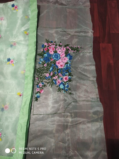 Pista green organza silk multi threadwork saree