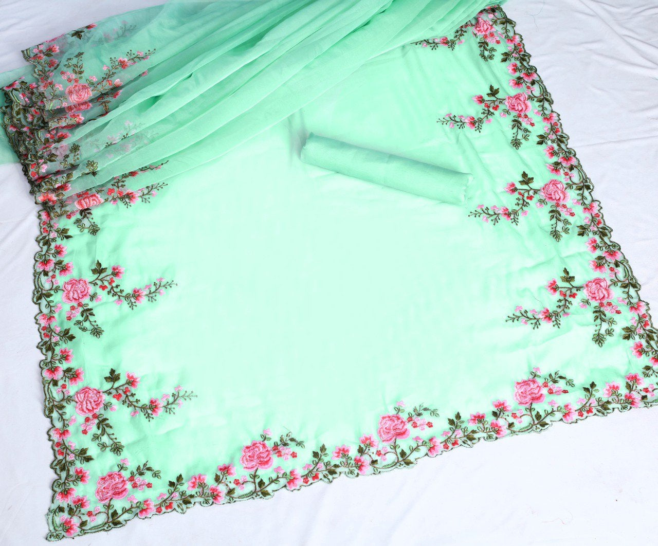 pista green organza silk thread embroidered designer saree