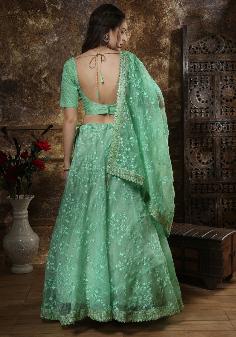 Pista green organza thread work lehenga choli