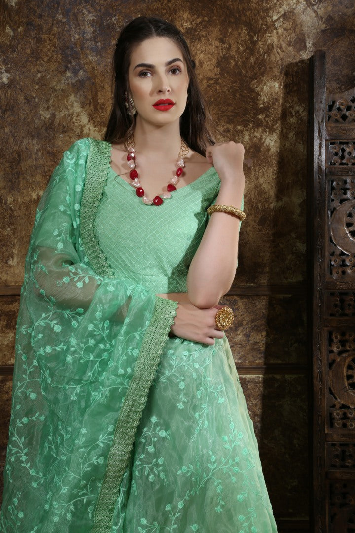 Pista green organza thread work lehenga choli