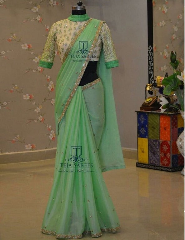 Pista green rangoli silk wedding saree