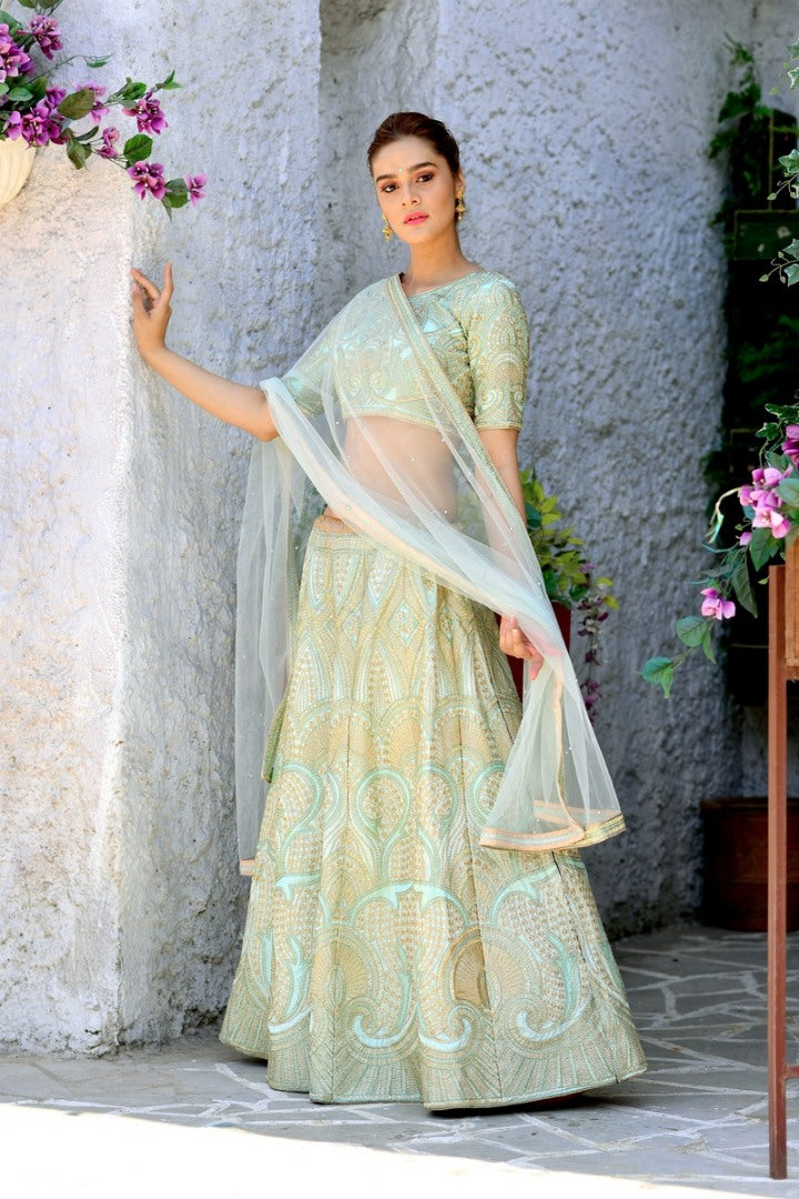 Pista green silk beautiful embroidered heavy wedding lehenga choli