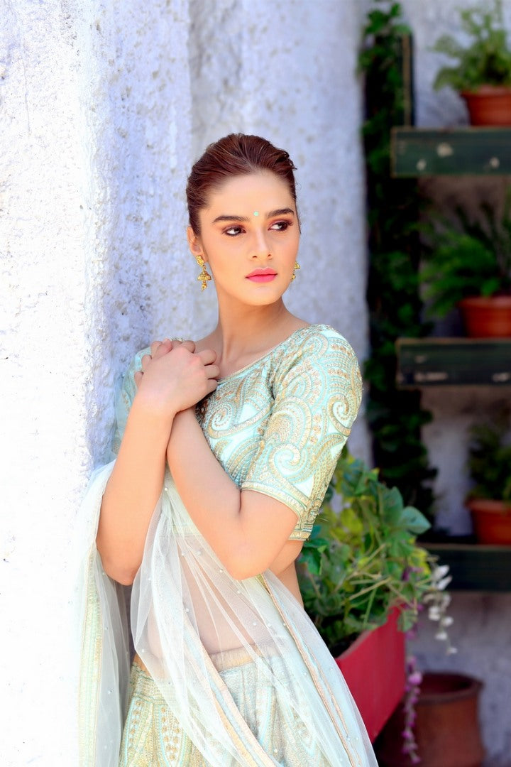 Pista green silk beautiful embroidered heavy wedding lehenga choli