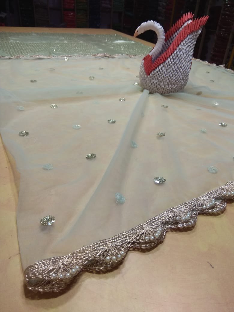 Pista green soft net beautiful worked lehenga choli for ceremony