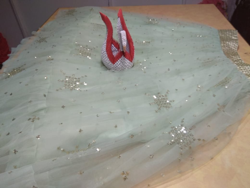 Pista green soft net beautiful worked lehenga choli for ceremony