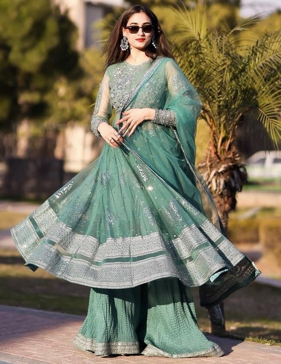 Pista green soft net embroidery worked wedding sharara suit