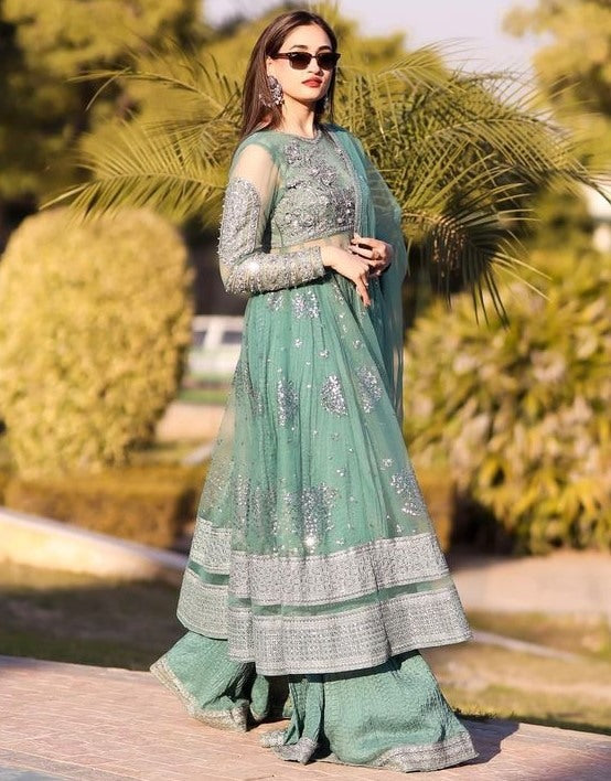 Pista green soft net embroidery worked wedding sharara suit