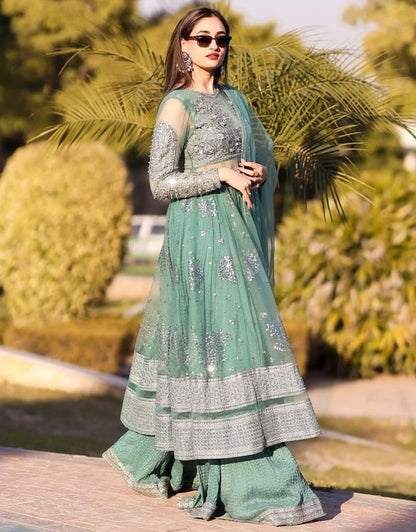 Pista green soft net embroidery worked wedding sharara suit