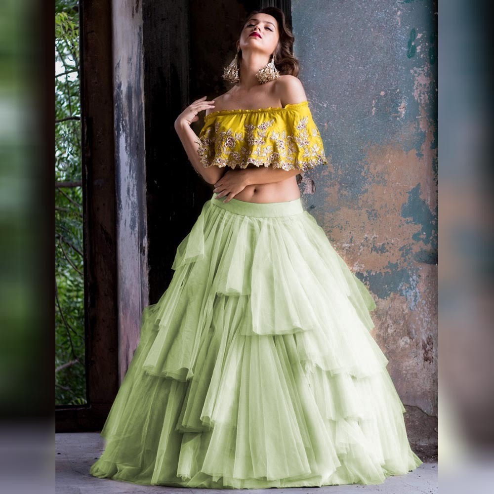 Pista green soft net multi layer lehenga with embroidered crop top