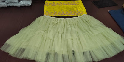 Pista green soft net multi layer lehenga with embroidered crop top