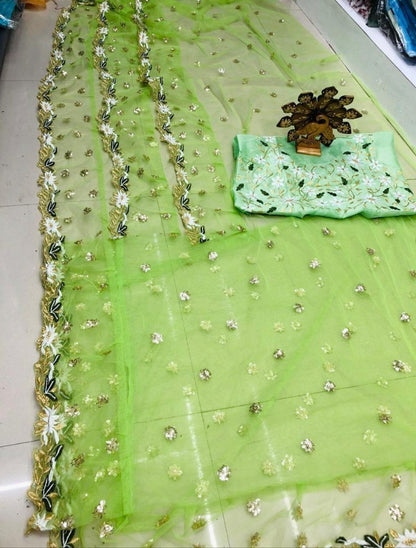 Pista green soft net sequence and thread work ruffle saree