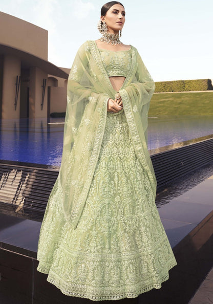 Pista green soft net sequence work bridal lehenga choli