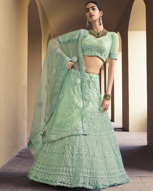 Pista green soft net sequence work bridal lehenga choli