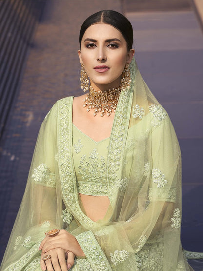 Pista green soft net sequence work bridal lehenga choli