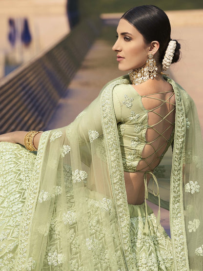 Pista green soft net sequence work bridal lehenga choli