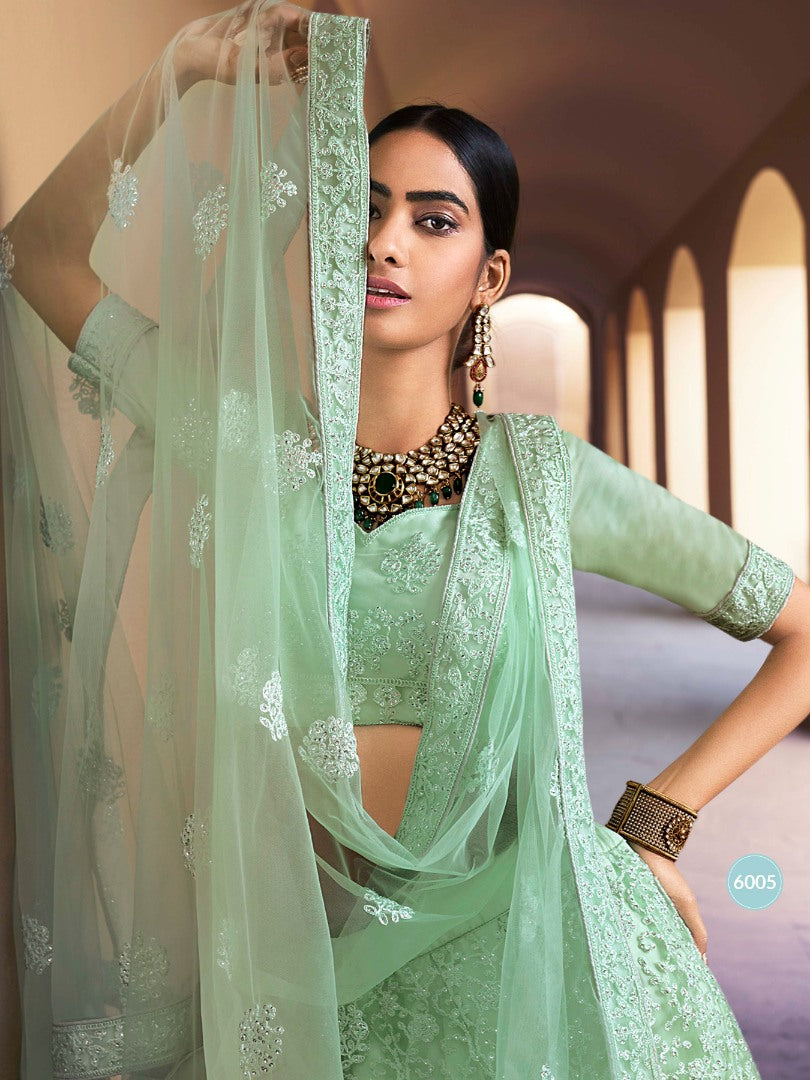 Pista green soft net sequence work bridal lehenga choli