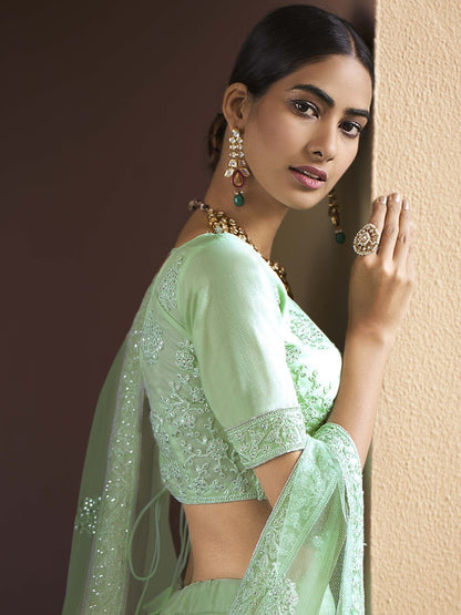 Pista green soft net sequence work bridal lehenga choli