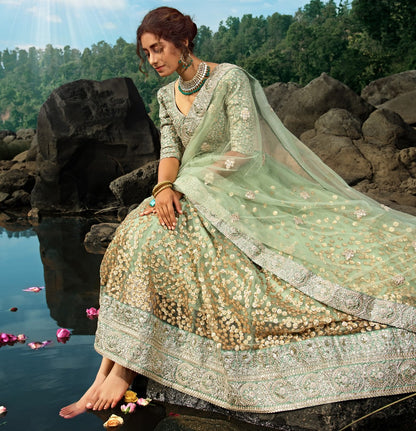 Pista green soft net sequence work bridal lehenga choli