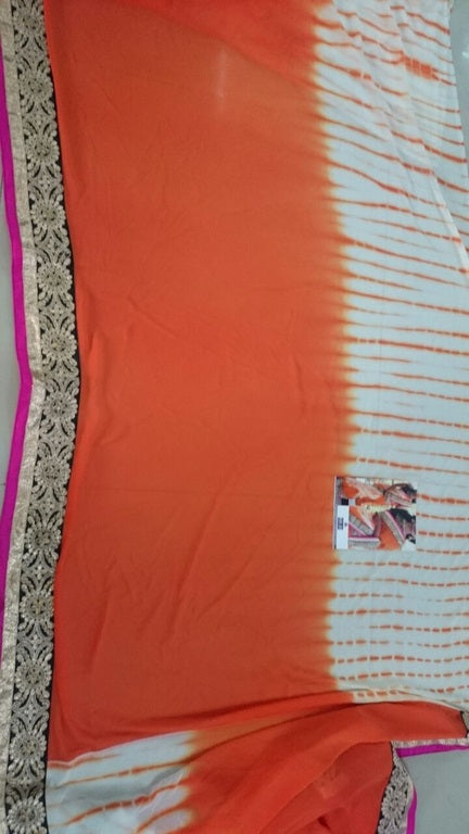 pretty look orange lace border saree with fancy blouse