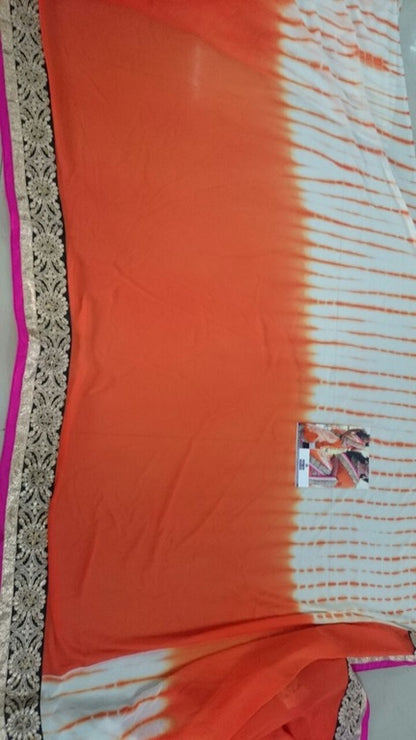 pretty look orange lace border saree with fancy blouse