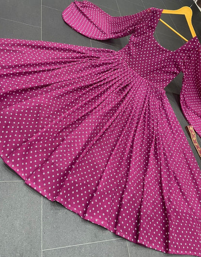 Purple georgette dot printed gown