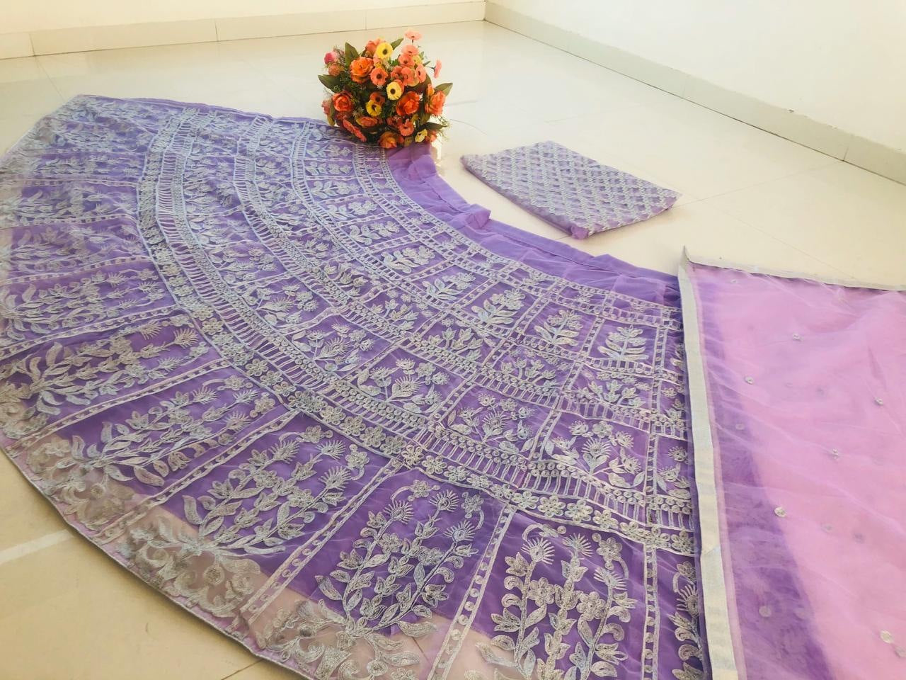 Purple net chain stitch embroidered wedding lehenga choli