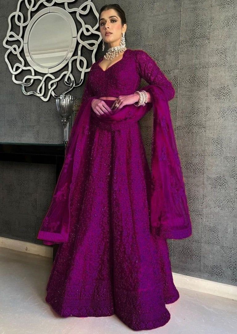 Purple net coding heavy dori work wedding lehenga choli