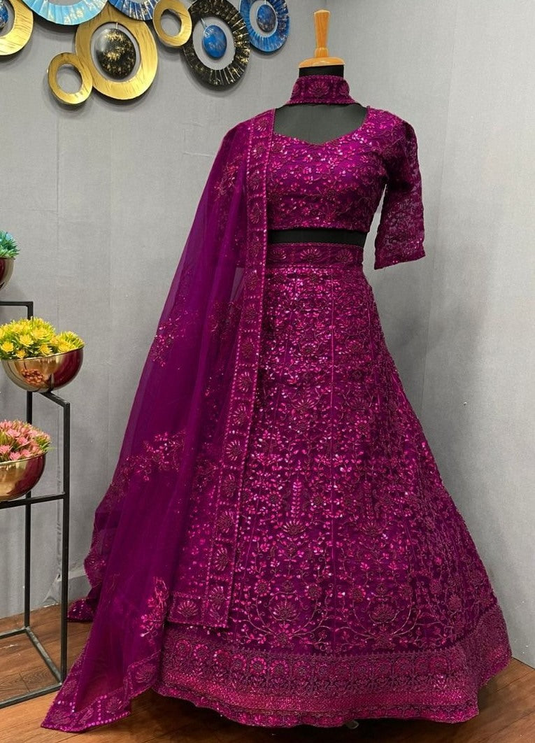 Purple net coding heavy dori work wedding lehenga choli