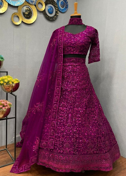 Purple net coding heavy dori work wedding lehenga choli